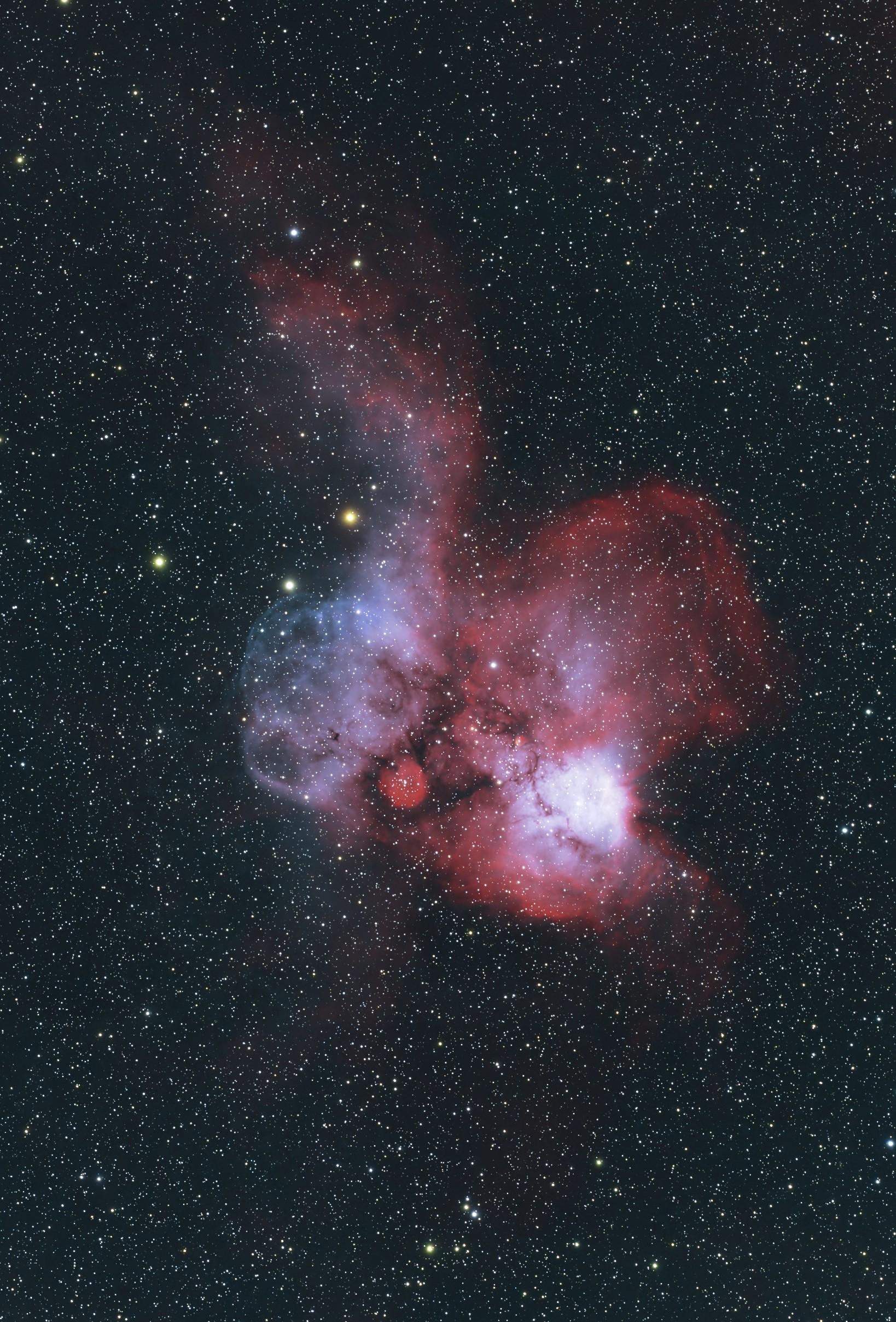 A picture of a nebulous cloud in blue and red